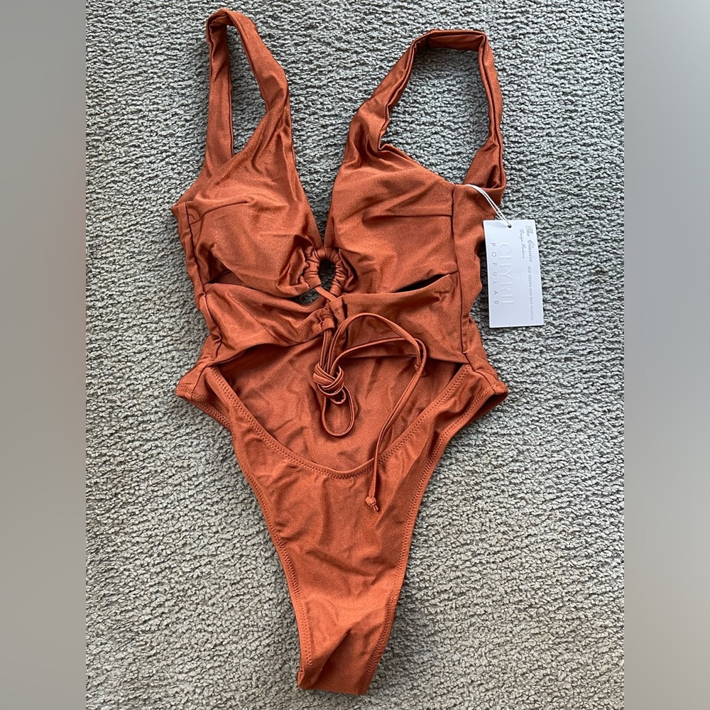 1 PIECE KEYHOLE/PEEKABOO SWIM SUIT! CHYRII. Shiny Cinnamon/Rust color. Size S.